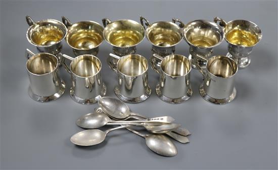 A set of five Edwardian miniature mugs, Deakin & Francis, Birmingham, 1911, a set of six silver coffee spoons etc.